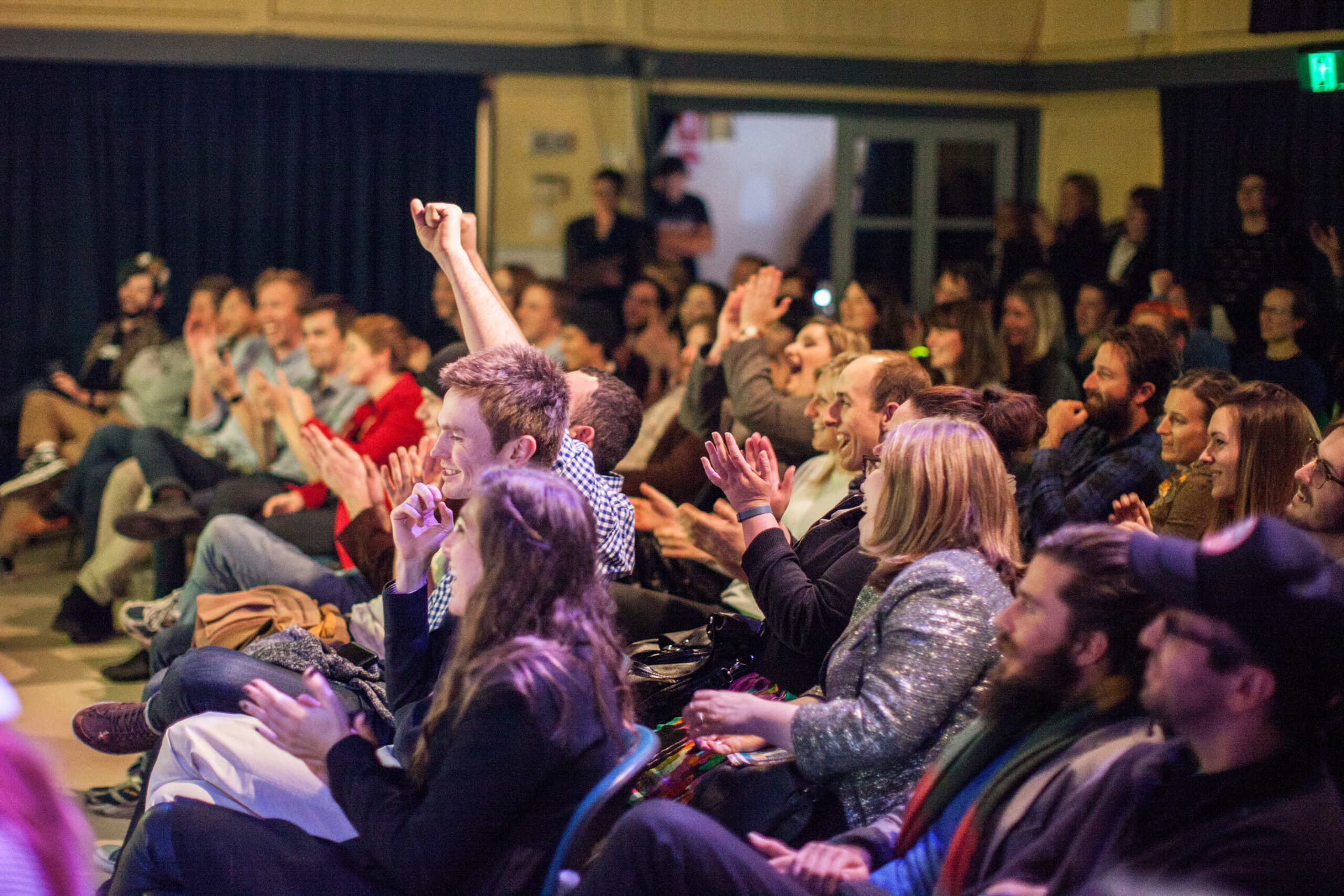Venue in Canberra for hire. Colourful and warm interior filled with people.
