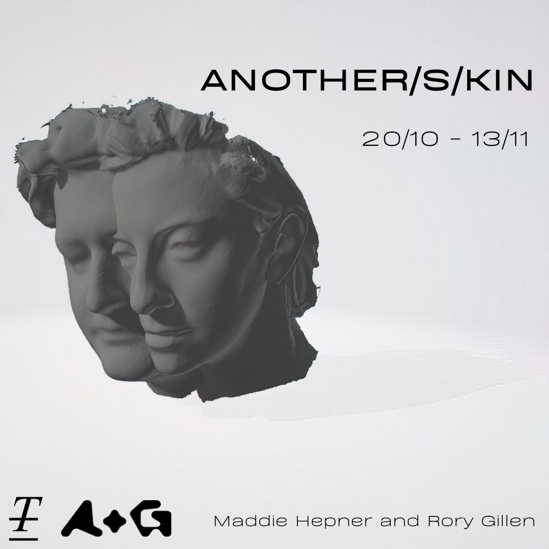 A dual faced statue bust floats in white space.