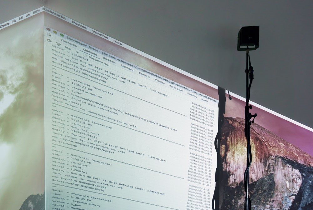 A projection of a wall of unreadable text