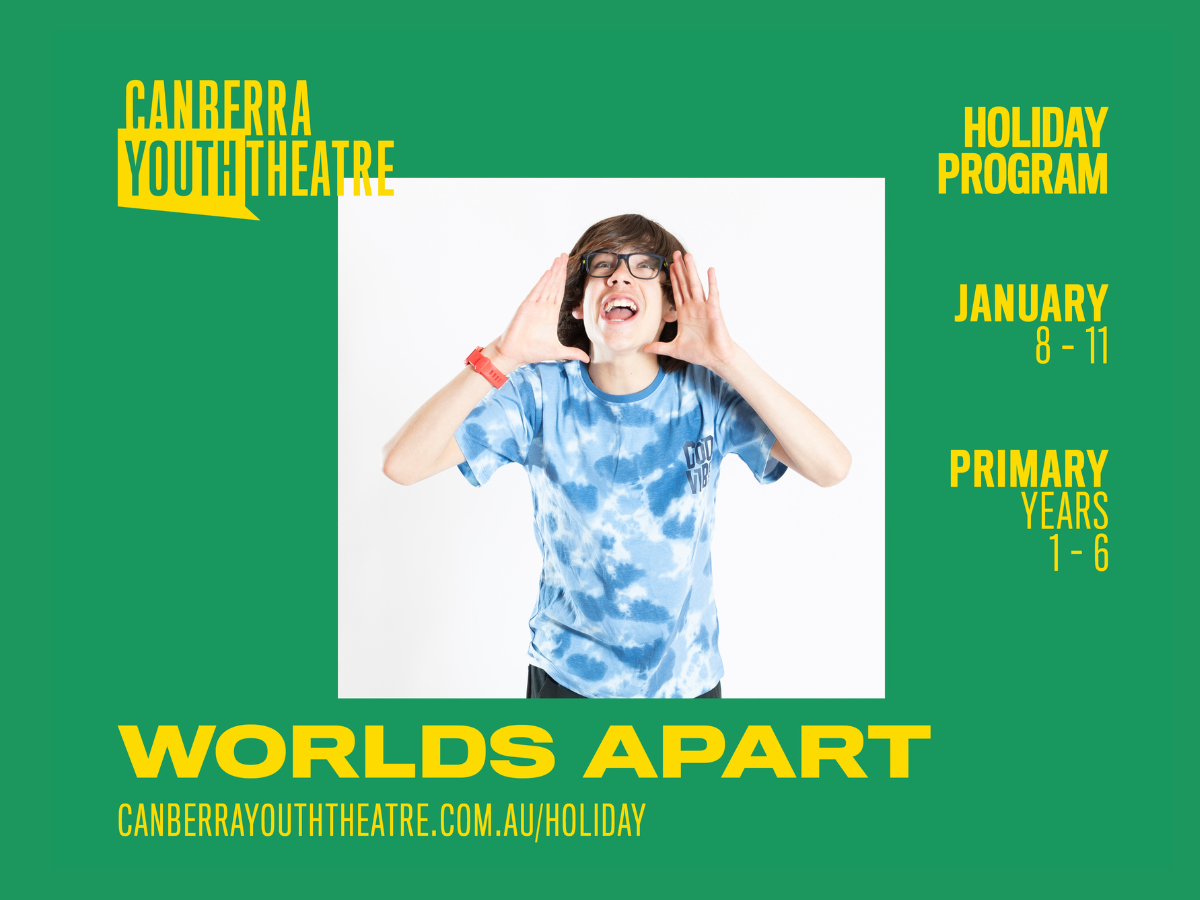 Boy stands in centre of colourful square frame with his hands cupped as he yells