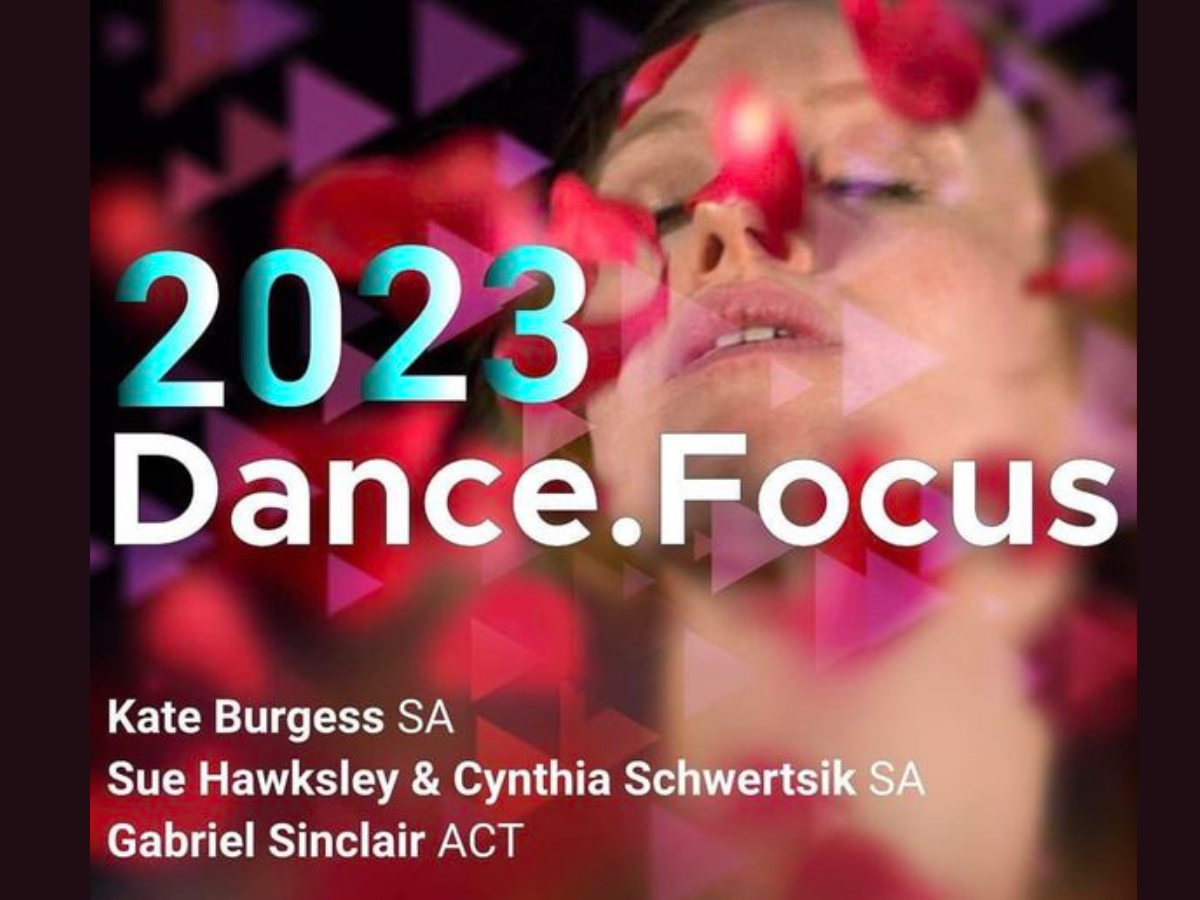 Triangle graphics are interpresed across the screen and a person blurring the background