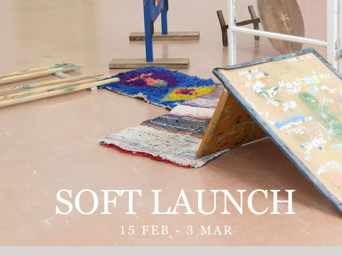 artworks lay on the floor of a gallery, the works 'Soft Launch' are emblazoned across the image.
